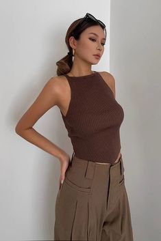 Chic Fitted Brown Camisole, Brown Fitted Cami Tank Top, Brown Stretch Halter Neck Tank Top, Brown Stretch Sleeveless Crop Top, Brown Stretch Sleeveless Tank Top, Trendy Non-stretch Sleeveless Top, Fitted Sleeveless Brown Knit Top, Trendy Brown Sleeveless Tank Top, Brown Stretch Cami Tank Top