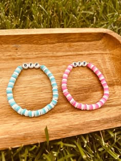 "This cute BFF set is perfect for two besties! One bracelet is pink, and the other is blue and they each have the letters \"BFF\" on them. This can also be a perfect gift that anyone can enjoy! Feel free to contact me if you have an problems/questions :) -FREEBIES- 🤍Every item you buy comes with freebie stickers, and candy 🤍" Bff Bracelets For 2 Alstetic, Cheap Trendy Friendship Bracelets For Birthday Gift, Cheap White Adjustable Friendship Bracelets, Matching Preppy Bracelets, Cheap White Name Bracelet With Heishi Beads, Bestie Bracelets Bead, Preppy Jewelry Bracelets Clay Beads, Preppy Bff Bracelets, Cheap Pink Braided Bracelets With Colorful Beads