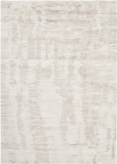 an area rug with white and beige colors