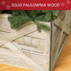 a christmas tree in a wooden box with the words sold palownia wood on it