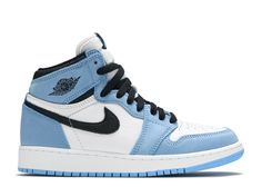 a pair of blue and white air jordans on a white background with black accents