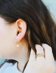 Adorn you hands with this timeless Minimal Initial Signet Ring. Hand-crafted from 14K yellow gold filled, this ultra-chic ring is a perfect gift for moms or couples. It's a unique, minimal piece with the power to carry a special, sentimental message. Rings are handmade in our Indiana studio. There will be a small color difference in the gold where it is soldered together in our studio. Please add initial in the NOTES box at checkout. Everyday Hypoallergenic 14k Gold Stackable Rings, Dainty Huggie Jewelry For Everyday, Dainty Huggie Everyday Jewelry, Fine Jewelry In 14k Gold Filled With Tiny Details, Minimalist Gold Huggie Jewelry, Simple Stackable Jewelry For Everyday, Simple Stackable Everyday Jewelry, Simple 14k Gold Filled Yellow Stackable Rings, Simple Everyday Stackable Jewelry