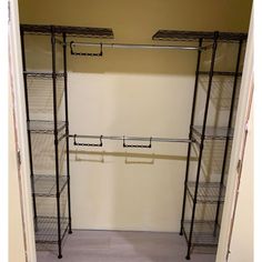 the closet is empty and has two shelves