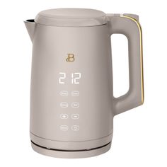 an electric kettle with thermometers on it's side and numbers displayed