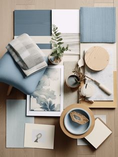 an assortment of items are displayed on the floor with blue and white colors in them