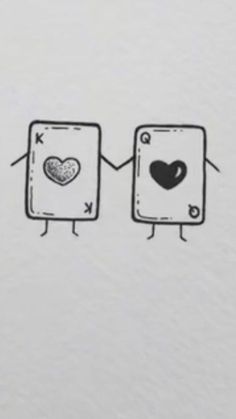 an image of two playing cards with hearts drawn on them and one has his hands holding the other's heart