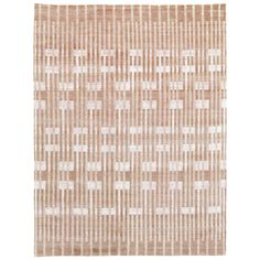 a beige and white rug with squares on it