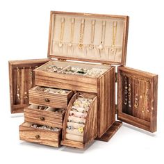 three wooden jewelry boxes with necklaces and bracelets in them, one opened to show the contents