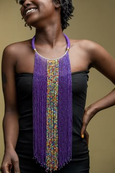 Unique Africa Maasai Handcrafted Beaded Necklace with an Elegant Look and Brilliant Finish. Color = Purple and Multi-Color Beads. Length (Around Neck) = 17 Inches / 43 Centimeters. Length ( Downwards ) = 14.5 Inches / 37 Centimeters. **GET FREE SHIPPING FOR ADDITIONAL ITEMS PURCHASED. Yes, Buy Multiple Items and pay shipping for 1 item only- The rest ships Free. (No Limits on the number of Multiple items). With a faster delivery time of 3 days via DHLExpress, Worldwide. Ordinary/Standard Shippin Traditional Adjustable Purple Jewelry, Handmade Purple Beaded Necklaces With Round Beads, Unique Purple Beaded Necklaces For Crafting, Purple Beaded Necklace For Party, Handmade Purple Beaded Necklaces For Party, Handmade Purple Beaded Necklace For Party, Purple Jewelry With Colorful Beads For Party, Purple Beaded Necklaces With Faceted Beads As Gift, Handmade Purple Choker For Party