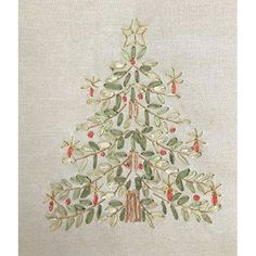 an embroidered christmas tree with holly and berries