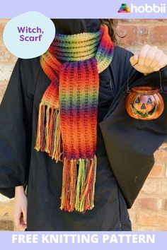 a woman wearing a colorful knitted scarf and holding a trick bag in her hands