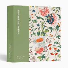 a book with an image of flowers on the front and back cover, in green