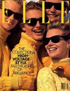 three women in yellow sweaters and sunglasses on the cover of a magazine with their arms around each other