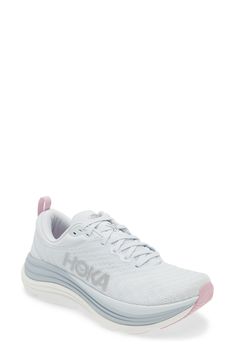 a women's white and pink running shoe