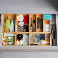 an open drawer with various items in it