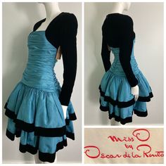 "Beautiful 1980s Miss O by Oscar de la Renta dress. Gorgeous blue taffeta with tule layered under each tier, black velvet sleeves and trim on skirt. This label is a step down from couture, and is constructed beautifully. Center back zipper closure, gathered bodice, this dress is quite heavy and full. There are a few faint small water marks on the skirt that are not very noticeable but mentionable. as this item has not yet been cleaned and  we have priced it accordingly. It's an absolutely stunning dress and really shows it quality and design Bust: 32\" Waist: 26\" Hip: 32-34\" Sleeve: 23.25\" Length: 39.25\" If you have any questions or would like more information about this listing, please don't hesitate to ask." 1980s Dresses Casual, Blue Dress Styling, 1980's Dresses, Dress Upcycling, Dynamic Clothes, 80s Formal Dress, 2000 Dresses, 2000s Dresses, Blue Dress With Sleeves