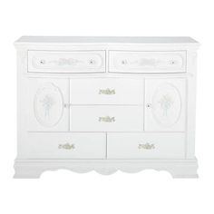 a white dresser with drawers and knobs