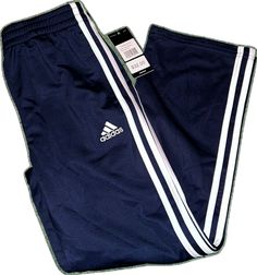 Sporty Blue Sweatpants With Three Stripes Branding, Blue Sporty Sweatpants With Three Stripes Branding, Adidas Blue Sweatpants For Jogging, Casual Blue Sweatpants With Side Stripes, Adidas Blue Sweatpants For Sports, Adidas Blue Jogging Bottoms, White Bottoms With Three Stripes For Jogging, White Jogging Bottoms With Three Stripes, Navy Sports Bottoms With Three Stripes