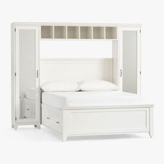 a white bed with two drawers and a book shelf above it, against a white background