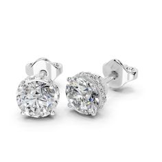 ABOUT SETTING: Round Brilliant Cut Lab Grown Diamond Halo Stud Earrings for women Setting, Featuring a timeless design that securely holds and showcases the brilliance of the solitaire diamond. ABOUT DIAMOND: These earrings feature lab-grown diamonds, guaranteeing they are sourced ethically. The size indicates the total diamond weight of the earring pair or the total weight of both diamonds. REFUND & RETURNS: Enjoy the comfort of a 30-day return policy. If you're not completely satisfied with your earrings, you can return them within 30 days for a full refund. CERTIFICATION: Each of our diamonds over 1 carat comes with an IGI certification, ensuring their quality and authenticity. Additionally, our jewelry pieces are also certified by IGI. This guarantees that you receive not only beautifu Formal Bridal Earrings With Vvs Clarity, Round Shape, Diamond Cut Bridal Earrings In Fine Jewelry Style, Formal Round Bridal Earrings With Vvs Clarity, Formal Bridal Earrings With Vvs Clarity, Diamond Cut Bridal Earrings For Anniversary, Dazzling Bridal Earrings With Vvs Clarity, Fine Jewelry Bridal Earrings, Round Shape, Vvs Clarity Drop Earrings For Bridal, Dazzling Vvs Clarity Bridal Earrings