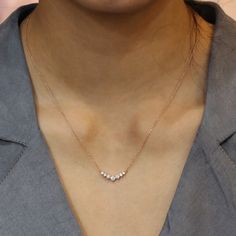 This classic yet unique diamond necklace is crafted in a lustrous 14k rose gold curved cluster pendant creating an eye-catching and chic look. The 7 white diamond pendant hangs gorgeously from a solid 14k rose gold cable chain. The length of the gold chain can be adjusted to either 16" or 18" long to suit your style! Adore her with this diamond drop pendant that can be made in your choice of white, rose, or yellow gold. ** The listing price is for one diamond necklace Availability: Ready to Ship 5 Stone Diamond Necklace, Simple Unique Necklace, Gold Chain Design With Pendant, New Chain Designs Gold, Rose Gold Chain With Pendant, Classic Diamond Necklace, Minimal Diamond Necklace, Small Diamond Necklace Simple, Gold Chain With Diamond Pendant