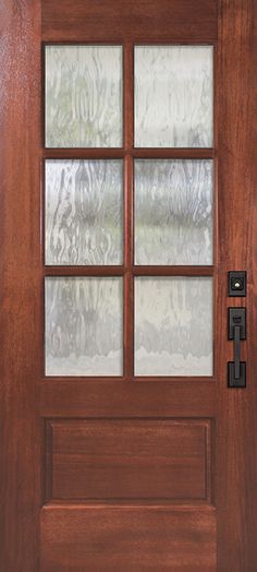 a wooden door with glass panels on it