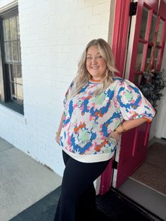 The prettiest curvy top that has fun colors and is so comfy. This is a blend with all the colors and has the prettiest pattern!! This runs true to size! Colorful Printed Fun Top, Fun Colorful Printed Top, Casual Tops With Vibrant Print For Fall, Playful Multicolor Printed Top, Oversized Playful Top For Fall, Oversized Casual Top With Abstract Print, Casual Oversized Top With Abstract Print, Multicolor Stretch Tops For Day Out, Stretch Multicolor Tops For Day Out