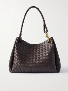 Bottega Veneta's 'Parachute' tote is crafted from leather woven using the brand's signature intrecciato technique. The bag features a gathered shape, a spacious interior, and adjustable shoulder straps. It has enough space for daily essentials, plus a tablet and spare change of flats. Bottega Veneta Bag Andiamo, Bottega Andiamo, Andiamo Bag, Bottega Veneta Andiamo, Bottega Bag, Dream Bag, Bag Obsession, Spare Change, Flat Dress Shoes