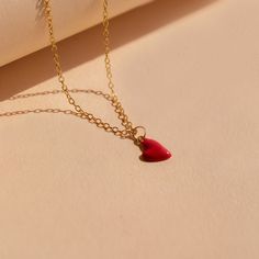 Let your big heart be showcased with our dainty Red Heart Necklace. The cherry red heart charm is minimalist and perfect for layering with any other chains in your collection. This charm necklace is a trendy yet everyday design to throw on and add brightness to a simple outfit. Material: High Quality Solid 925 Sterling Silver Finish: Sterling Silver ∙ 18K Gold Featuring a ~8 x 6mm Red Enamel Heart Charm with minimalist cable chain adjustable 16 inches to 18 inches SKU: RR-NR141 Trendy Heart Charm Necklace With Delicate Chain, Trendy Heart Print Jewelry For Gifts, Trendy Heart Beads Charm Necklaces As Gift, Trendy Charm Necklaces With Heart Beads For Gifts, Trendy Heart Beads Charm Necklace For Gifts, Trendy Heart Charm Necklaces For Everyday, Trendy Heart Charm Necklace For Everyday, Trendy Everyday Heart Charm Necklace, Trendy Charm Necklace With Heart Beads