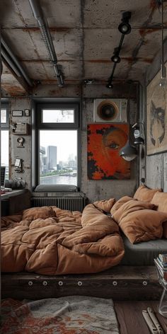 an industrial bedroom with exposed ceilings and bedding in the foreground, large window to the right