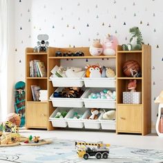 a child's room with toys and bookshelves on the floor, including toy cars