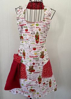 a woman's apron hanging on a wall