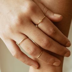 "DAINTY STACKING RING. Stack them or wear it alone. You will never want to take them off! I promise :). **Sold individually **Shower safe! ------------------------------- M A T E R I A L S * A N D * S I Z I N G 14Karat gold filled and shower safe! Size: 5,6, 7, 8 and 9 -------------------------------- W H A T * I S * G O L D * F I L L E D * G O L D * P L A T E D * A N D * V E R M E I L * M A T E R I A L GOLD FILLED: - Under normal wearing conditions and with proper care, your gold filled jewelry Dainty Adjustable Initial Ring With Simple Design, Adjustable Dainty Initial Ring For Promise, Simple Stackable Promise Rings, Minimalist Tiny Stackable Promise Rings, Simple Stackable Open Rings, Dainty Adjustable Rings For Everyday Wear, Dainty Everyday Ring With Tiny Details, Minimalist Stackable Rings As A Gift, Minimalist Adjustable Initial Ring With Simple Design