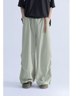 Drapey Track Pants with Drawstring offer the perfect blend of comfort and style. These relaxed-fit pants feature an adjustable drawstring waist and a drapey silhouette, ideal for both lounging at home and stepping out in style. Available in multiple colors, they can be dressed up or down for various occasions. Size Chart (in cm): Size S M L XL Waist 68 72 76 80 Hip 114 118 122 126 Cuff 70 72 74 76 Length 99 101 103 105 Note: Measurements are provided in centimeters. Please refer to the size char Baggy Drawstring Wide-leg Harem Pants, Baggy Drawstring Wide-leg Pants, Baggy Wide-leg Drawstring Pants, Baggy Wide-leg Pants With Drawstring, Spring Baggy Cargo Pants With Drawstring, Spring Baggy Drawstring Cargo Pants, Baggy Wide Leg Trousers With Drawstring, Spring Cargo Pants With Drawstring, Spring Cargo Pants With Drawstring And Loosely Fitted Hips