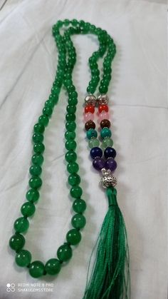 108 Beads Natural green onyx Japa Mala Prayer Beads semi-precious Gemstone Round Beads // Long Tassel Necklace// Meditation japa mala // Guru bead// Necklace Yoga Beads green Color // 8 mm Bids size - 8mm approx 40 inch seven chakra necklace color - green It is known as the 'love stone' as the message it emits is the strong vibration of unconditional love, joy, warmth and healing. As quartz crystals are profound amplifiers of energy, it may help to kindle happiness, love, romantic feelings and s Green Spiritual Beads, 108 Count, Green Jade Beaded Necklace For Meditation, Traditional Green Jade Beaded Necklaces, Traditional Green Jade Beaded Necklace, Handmade Green Malachite Beaded Necklace, Green Agate Beaded Necklaces With Colorful Beads, Green Agate Colorful Beaded Necklaces, Colorful Green Agate Beaded Necklaces, Green Round Beads Bracelets For Meditation