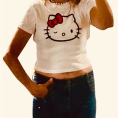 Hello Kitty T!!! Marked Size L But Fit Me Like S/M. 100% Cotton. Nwt Cute Fitted White T-shirt, Cute Stretch T-shirt, Trendy Hello Kitty Print Crew Neck Top, Trendy Hello Kitty Print Summer T-shirt, Trendy Hello Kitty Print T-shirt For Summer, Spring White T-shirt With Cat Design, Cute White Stretch T-shirt, Fitted Cat Print T-shirt For Spring, 90s White Stretch Tops