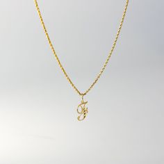 A timeless piece that will never go out of style. This 14K gold calligraphy pendant is the perfect and most stunning way of keeping a name close to your heart. We handmade each piece so you can assure you're getting a one-of-a-kind pendant that is not like any other. This 14K solid gold letter pendant is flawlessly crafted to look super chic and elegant around your neck. Pair it with a nice gold chain and wear it with almost all of your outfits. The piece is such a versatile lettering necklace. Yellow Gold Pendant Charm Necklaces With Monogram, Yellow Gold Monogram Pendant Charm Necklaces, Gold Initials Pendant Necklace, Yellow Gold Monogram Pendant Charm Necklace, Gold Custom Initial Pendant Necklace, Gold Custom Initial Pendant Necklace Hallmarked, Custom Gold Initial Pendant Necklace, F Necklace, F Initial