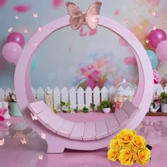 there is a mirror and flowers on the table