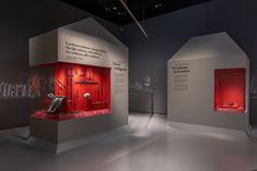 two red and white displays on display in a museum