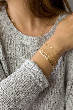 "Beautiful dainty chain bracelet in 14K gold or sterling silver. Our delicate bracelets are offered in four unique styles: coin chain, tube chain, lace chain or satellite chain. Pick one or more for a custom layering look just for you or as a perfect holiday gift. *listing is for ONE delicate bracelet in chain of your choice D E T A I L S * choice of chain: coin chain, tube chain, lace chain or satellite chain * 100% 14K gold fill or sterling silver chain and findings * strong lobster clasp clos Anting Manik, Gold Armband, Dainty Chain, Bracelet Chain, Gold Bracelet Chain, Layered Bracelets, Bracelets For Women, Bracelet Gold, Dainty Jewelry