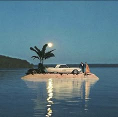 two people standing on an island in the middle of water with a car parked next to it