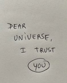 a piece of paper with writing on it that says dear universe, i trust you