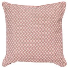 a pink and white pillow with diamond pattern on the front, sitting on a white background