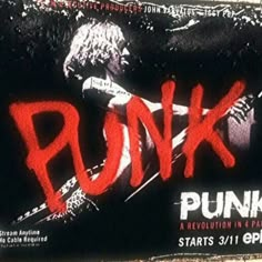 an advertisement for punk is displayed on the wall