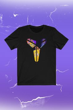 a black t - shirt with an image of a bird on it's chest