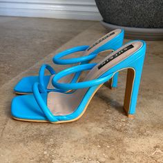 She&In Size 7.5 (38) In A Beautiful Blue Leather Color. Never Worn New Condition. Heel Height Is 4 1/2in. (K) Blue Heels With Wrapped Heel And Square Toe, Blue High Heel Sandals With Heel Strap, Trendy Blue Heels With Heel Strap, Blue Sandals With Padded Open Heel, Blue Sandals With Wrapped Block Heel, Blue Heels With Ankle Strap And Padded Heel, Blue Heels With Padded Heel And Ankle Strap, Blue Heels With Heel Loop For Summer, Summer Blue Sandals With Branded Heel Counter