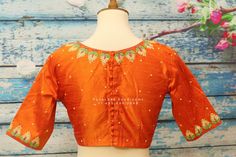 ❥ Handmade Designer stitched blouse ; Can be used for sarees / Lehengas / crop tops. ❥ We can customize in your requested size & Color choices ; ❥ We can make in different design / Size / Color of your choice ! ❀❀ Return / Exchange Policy : ※ No Return/ No Exchange / No Cancellation! ※We need proof of video while package is opening for considering any case of missing or damaged products ; ※ We can not accept any returns , if video at the time of package opening is not provided by the client Diwali Orange Art Silk Blouse, Festive Orange Art Silk Blouse, Orange Anarkali Blouse With Pallu, Traditional Paithani Silk Blouse With Zari Work, Traditional Orange Blouse With Zari Work, Festive Banarasi Silk Blouse With Motifs, Traditional Paithani Silk Blouse With Cutdana, Orange Art Silk Blouse With Pallu, Orange Blouse With Pallu For Puja