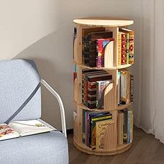 a book shelf sitting next to a blue chair