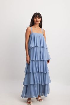 Tiered Chiffon Maxi Dress Blue | NA-KD Flowy Maxi Dress With Ruffled Straps For Bridesmaids, Summer Floor-length Tiered Dress With Ruffles, Layered Tiered Maxi Dress For Summer, Tiered Ruffle Maxi Dress For Bridesmaids, Tiered Ruffle Bridesmaid Maxi Dress, Tiered Chiffon Evening Dress, Tiered Chiffon Evening Dress For Summer, Bridesmaid Tiered Maxi Dress With Ruffles, Bridesmaid Maxi Dress With Ruffled Straps