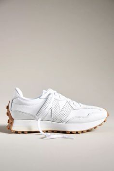 New Balance 327 Sneakers | Anthropologie Shoes With Outfits, Dressing Shoes, Trendy Shoes Sneakers, New Balance 327, Cute Sneakers, Womens Athletic Shoes, Gym Shoes, Shoe Closet, New Balance Shoes